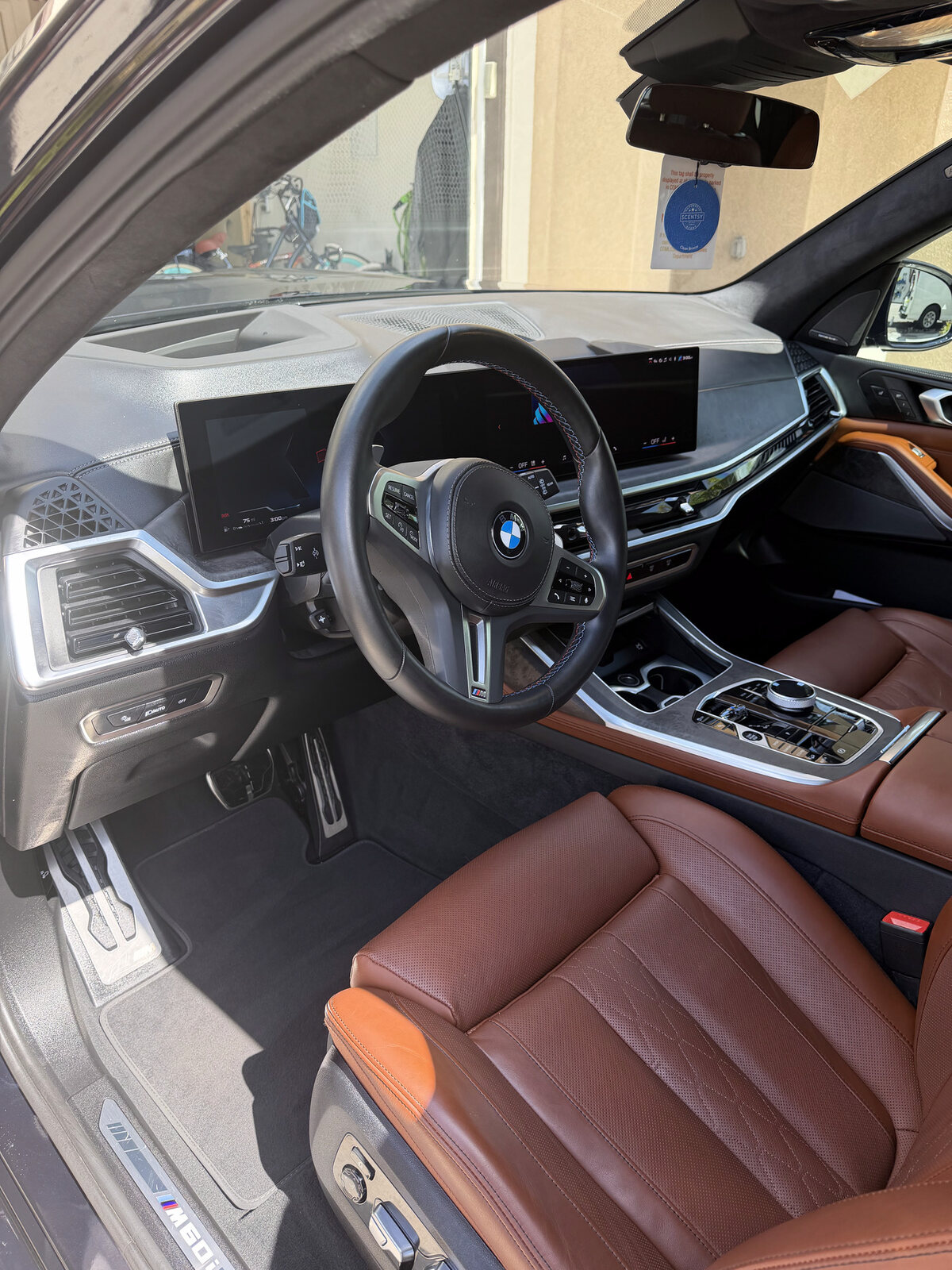 Freshly detailed BMW interior with cognac leather